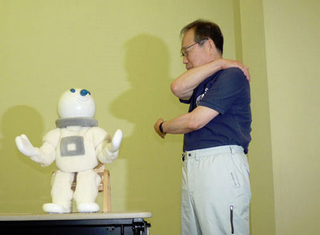 Illustration for article titled Taizo Robot Doesn't Help My Fear of Clowns, or Exercise